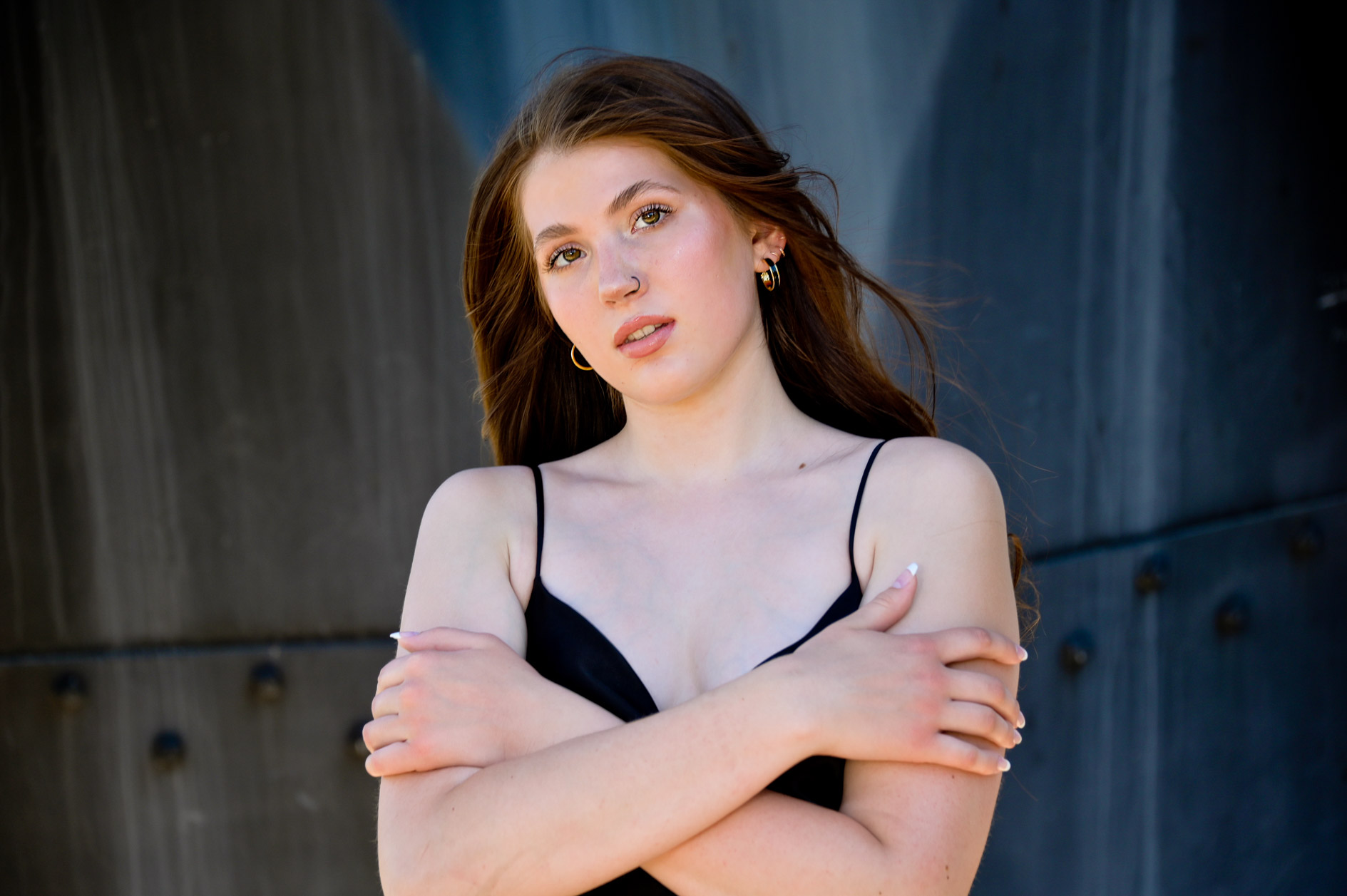Farmington high school senior poses downtown Detroit for this modern senior photo.