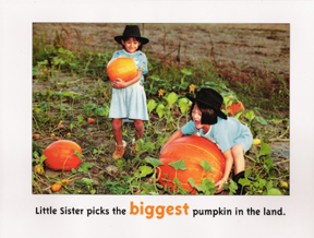 Michigan children's book writer and illustrator shows pages from the book big sister, little sister